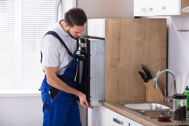 Man installing appliance